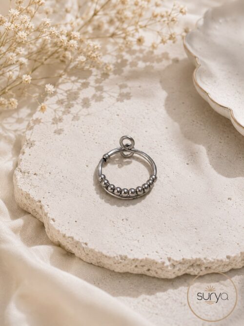 Anillo anti estrés plateado cuentas móviles