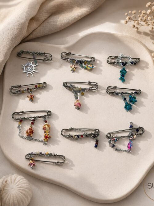 Broches plata a elegir